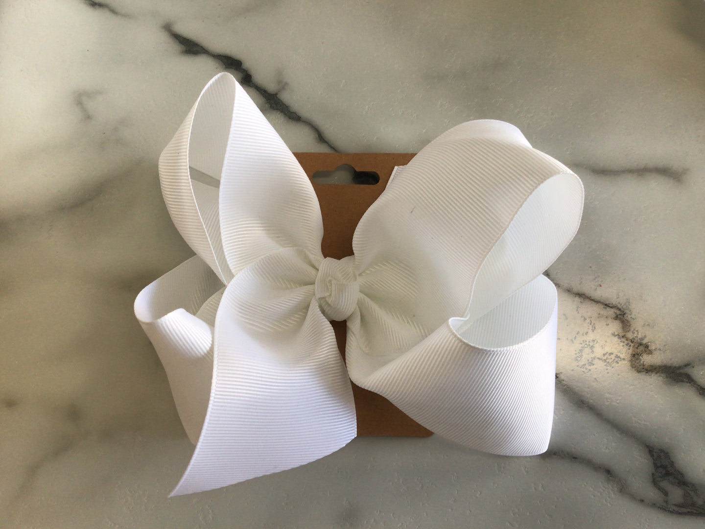 Small white bow