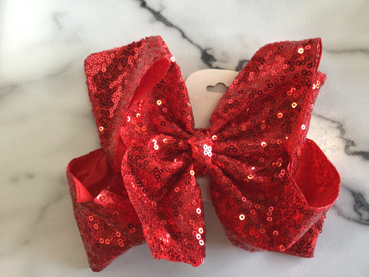 Red sparkle bow