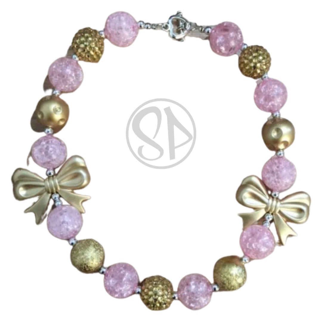 Gold, pink and bows bubblegum necklace